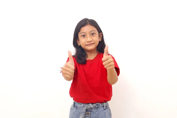 Adorable Asian Little Girl Standing While Showing Thumbs Isolated White — 图库照片