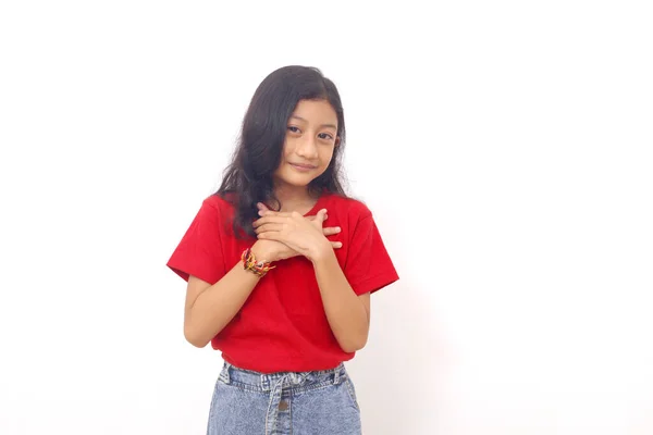 Relieved Asian Little Girl Standing Hands Chest Feeling Peaceful Comfort — Fotografia de Stock