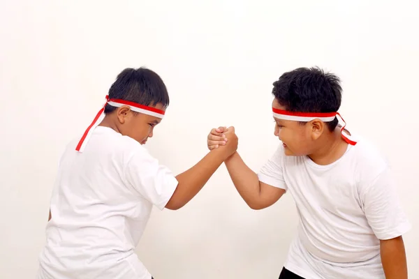 Two Asian Boys Standing Teamwork Gesture Indonesian Independence Day Concept — Stok Foto