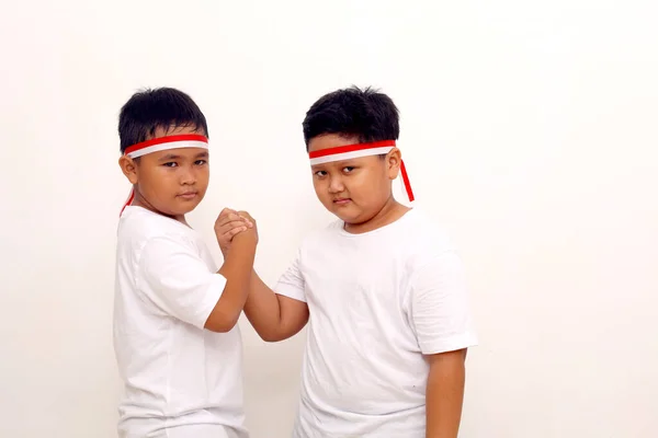 Two Asian Boys Standing Teamwork Gesture Indonesian Independence Day Concept — Stock Fotó