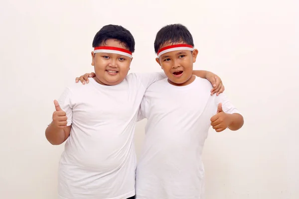 Adorable Asian Boys Standing While Showing Thumbs Indonesian Independence Day — Zdjęcie stockowe