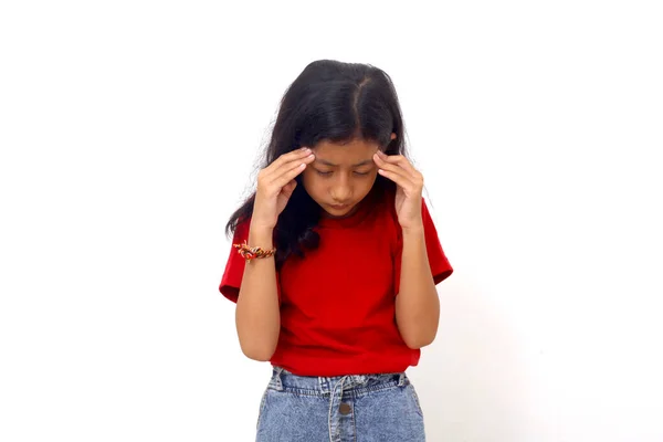 Stressed Asian Little Girl Standing While Holding Her Head She — Fotografia de Stock