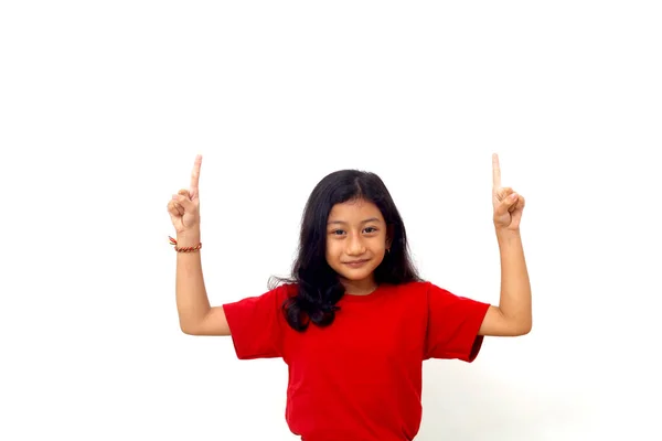 Happy Asian Little Girl Standing While Pointing Isolated White Copyspace — Foto Stock