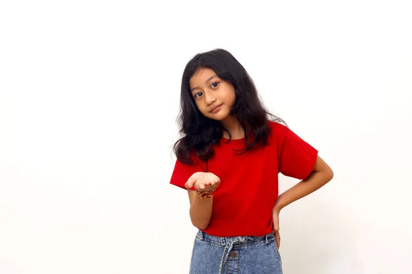 Happy Asian Little Girl While Presenting Something Empty Space Isolated — 图库照片