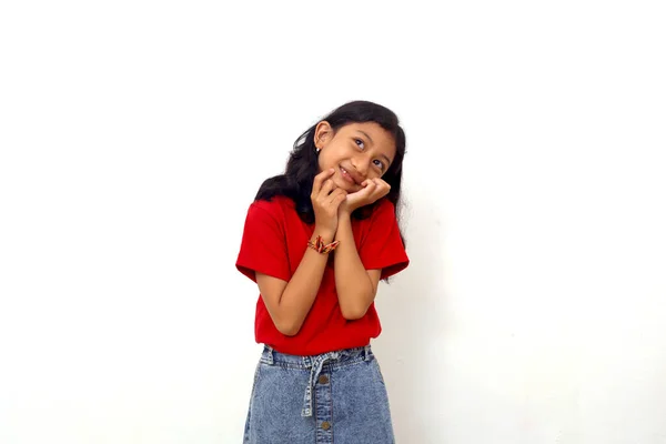 Adorable Asian Little Girl Standing While Thinking Something Isolated White — Stockfoto