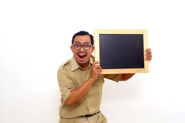 Wow and amazed expression of Indonesian government employees while presenting blank black board