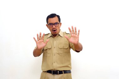 Angry Indonesian government employees while standing and yelling no. Isolated on white background