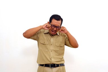 Sad Indonesian government employees standing while crying loud. Isolated on white