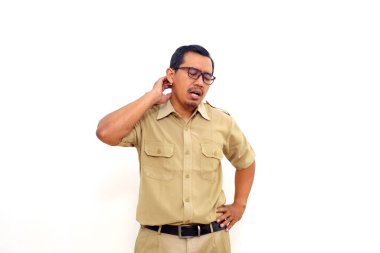 Indonesian government employees standing with tired gesture. Isolated on white