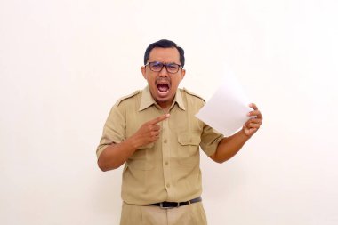 Angry Indonesian government employees standing while holding a paper. Dissatisfied with the report concept