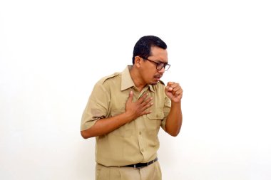Indonesian government employees coughing into his fist. Isolated on white background