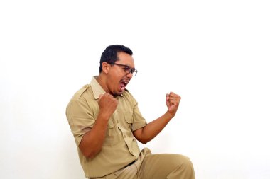 Succeed Indonesian government employees standing while clenching hands and shouting. Isolated on white