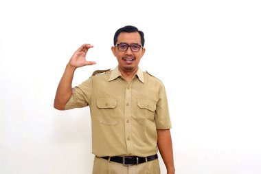Indonesian government employees standing while gesturing letter C. Isolated on white background
