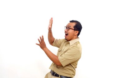 Wow and surprised expression of Indonesian government employees standing while looking sideways