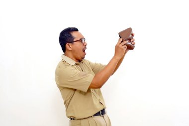 Surprised Indonesian government employees standing while checking his wallet. Isolated on white