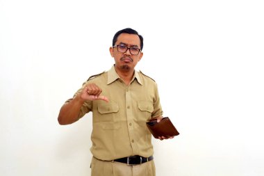 Disappointed Indonesian government employees standing while holding a wallet and showing thumbs down