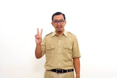 Enthusiastic Indonesian government employees standing while showing two fingers. Isolated on white