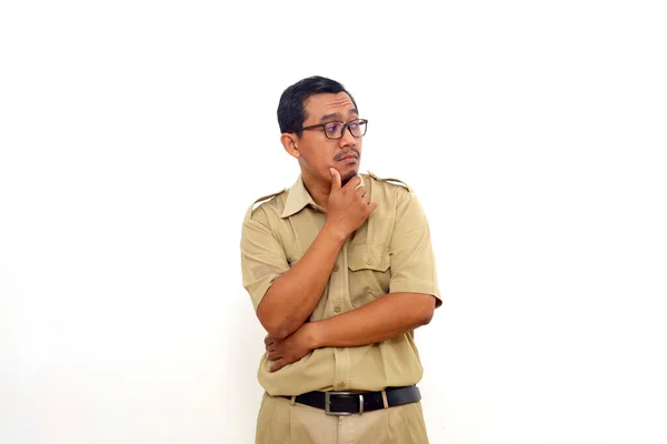 Indonesian Government Employees Standing While Glancing Sideways Isolated White Background — Stockfoto