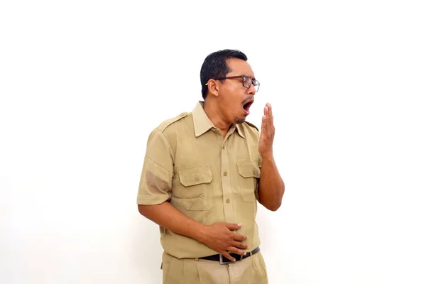 Tired Indonesian Government Employees Standing While Yawning Feels Sleepy Isolated — Foto Stock