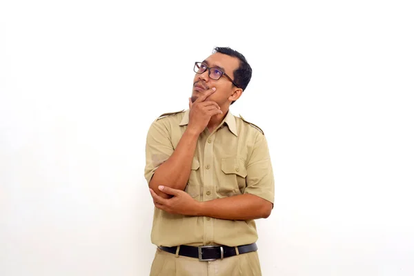 Thoughtful Indonesian Government Employees Standing While Looking Isolated White Background — 스톡 사진