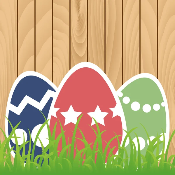 Huevos de Pascua sobre fondo de madera — Archivo Imágenes Vectoriales