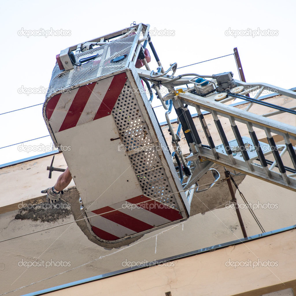 Firefighters working to put uncertainty of a cornice 