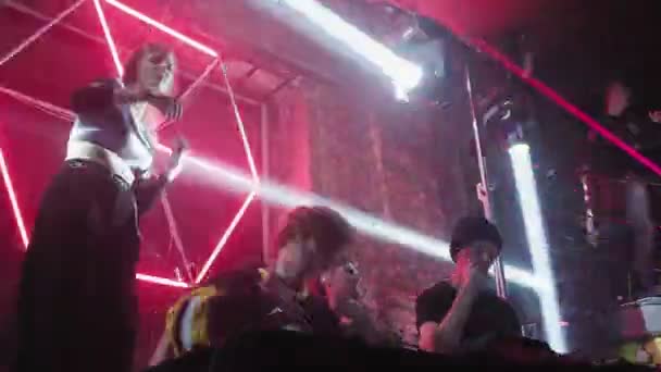 RUSSIA, VLADIMIR, 02 OCT 2021: young people dancing at dj console at nightclub — Stock Video