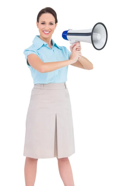 Cheerful classy businesswoman holding megaphone — Stock Photo, Image