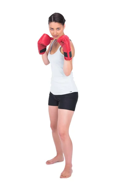 Serious young model in sportswear boxing — Stock Photo, Image