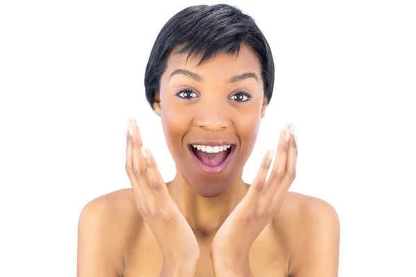 Joyful black haired woman raising her hands — Stock Photo, Image