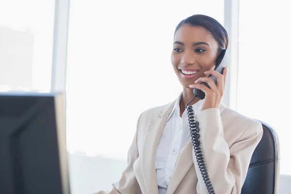 Cheerful gorgeous businesswoman on the phone — Stock Photo, Image