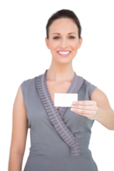 Happy seductive woman holding business card — Stock Photo, Image
