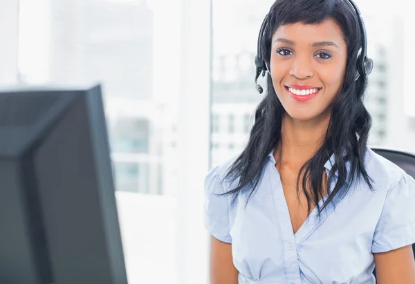 Pleased operator looking at camera — Stock Photo, Image