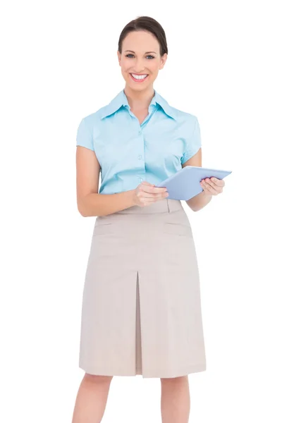 Happy young businesswoman holding tablet pc — Stock Photo, Image