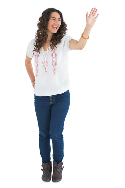 Cheerful attractive brunette smiling while greeting — Stock Photo, Image