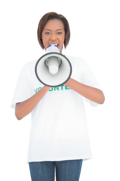 Mujer voluntaria gritando en megáfono —  Fotos de Stock
