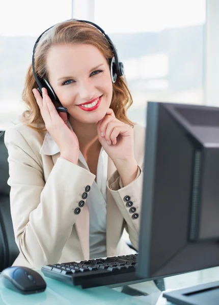 Joyful pretty operator looking at camera — Stock Photo, Image