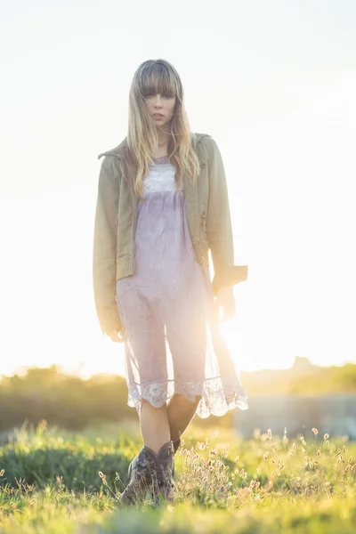 Fashionable young girl in sheer dress and jacket — Stock Photo, Image