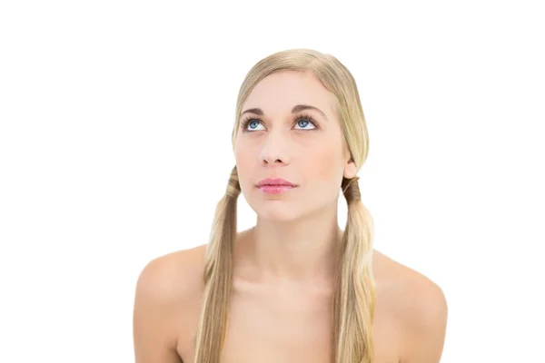 Pretty young blonde woman looking up — Stock Photo, Image