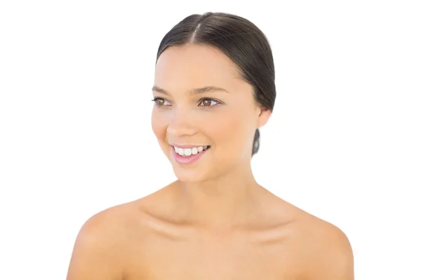 Smiling brunette looking away — Stock Photo, Image