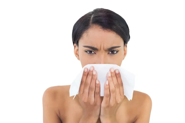 Sick gorgeous model blowing her nose — Stock Photo, Image