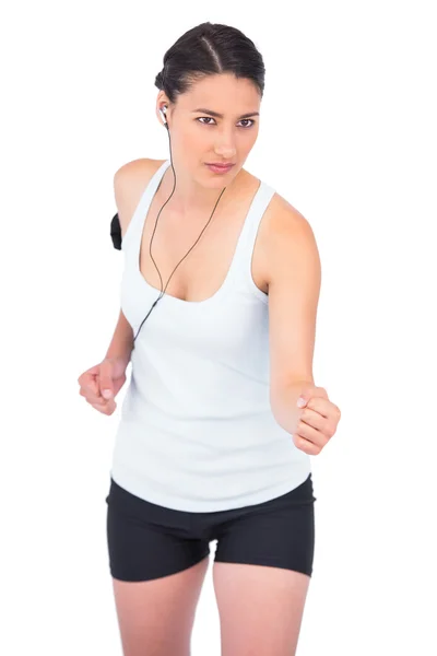 Serious fit model jogging — Stock Photo, Image