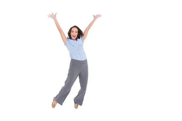 Alegre elegante mujer de negocios saltando — Foto de Stock