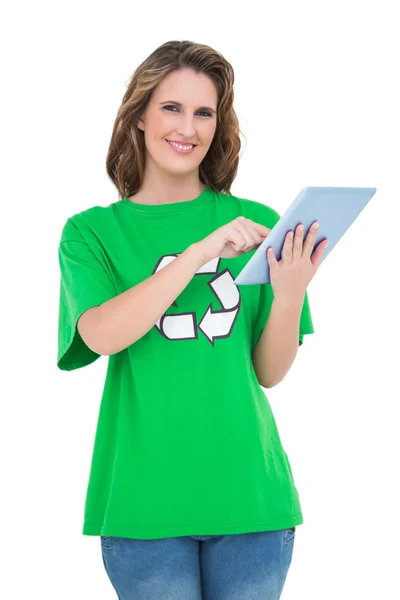 Happy environmental activist using tablet looking at camera — Stock Photo, Image