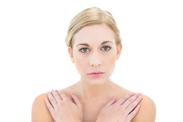 Serious young blonde woman looking at camera — Stock Photo, Image