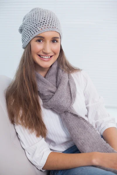 Cheerful attractive brunette with winter hat on posing — Stock Photo, Image