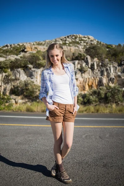 Smiling woman posing in front of camera — Stock Photo, Image