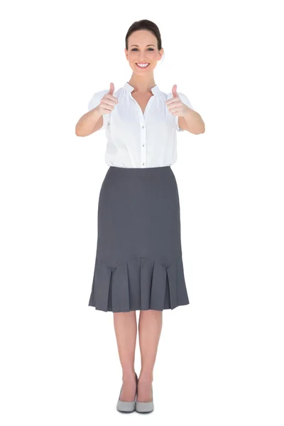 Cheerful businesswoman posing thumbs up — Stock Photo, Image