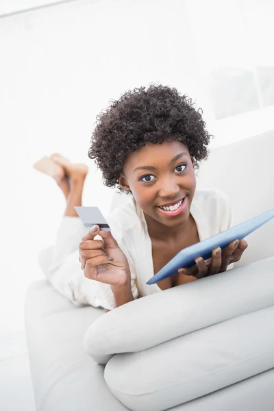 Happy gorgeous brunette shopping online — Stock Photo, Image