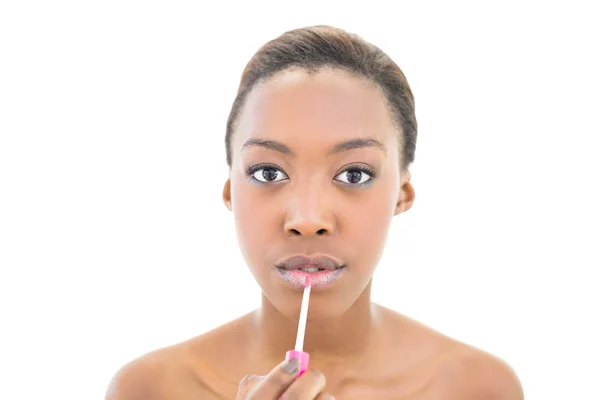 Natural beauty using lip gloss — Stock Photo, Image